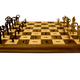Illustration for article titled Skeleton Key Chess Board Puts The Smackdown On Sore Losers